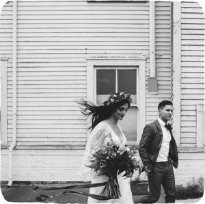 A black and white photo of a bride and groom